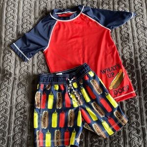 Gently used swimming trunks with water shirt.